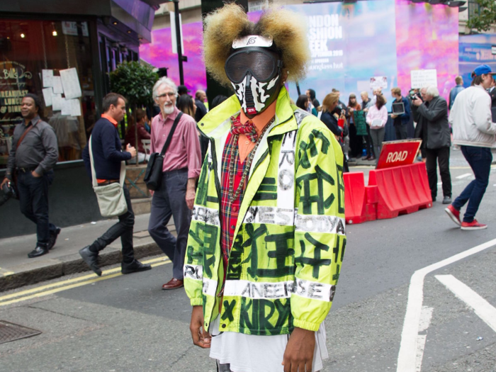 1. This unusual ensemble was spotted on blogger "Reckless" outside the David Koma fashion show on September 18. The outfit consists of a customised hi-vis jacket and ski-mask.