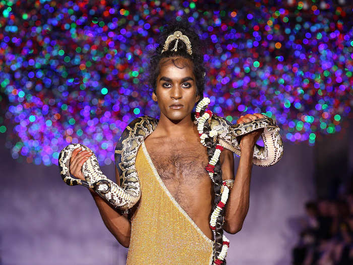 13. The Ashish show was full of ostentatious fashion choices. One male model wore a live python on the catwalk, and finished the look with a toga.