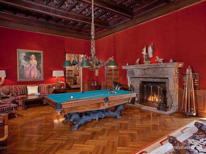 The billiards room is 32 feet long and opens up to a hallway that