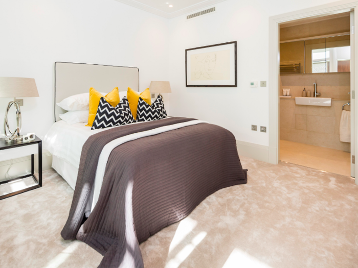 And the guest bedrooms (here is one out of two) are just as luxurious with soft furnishing and an ensuite bathroom.