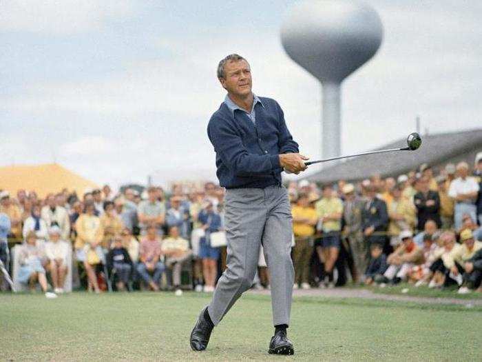 Palmer watches the flight of his ball at the 1071 U.S. Open.