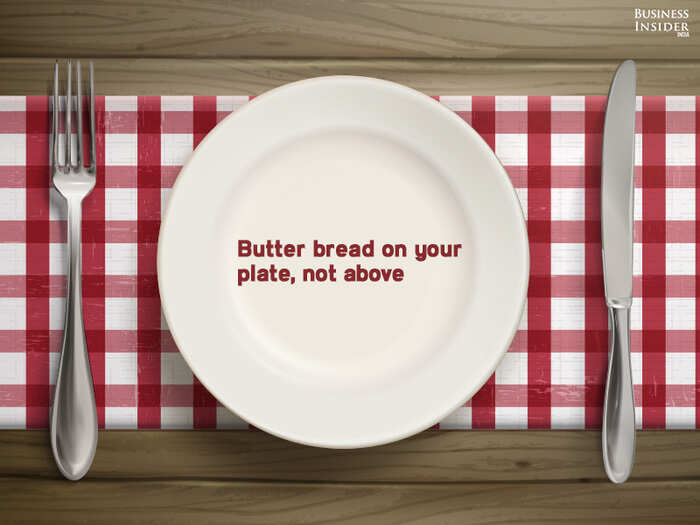 Butter bread on your plate, not above