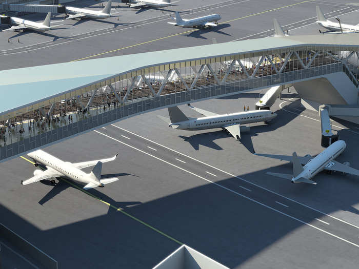 The gates will be located on "island concourses," which will be attached to the main terminal by elevated pedestrian bridges. Those walkways will be high enough off the ground to allow airplanes to pass underneath, allowing them to take full advantage of the added taxi space.