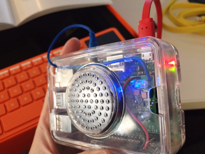 Next, I connected the speaker to the Raspberry Pi and snapped it onto the protective case. Once I plugged it into the outlet, it lit up and started loudly beeping, so I knew it all worked. The computer itself was now ready to go.