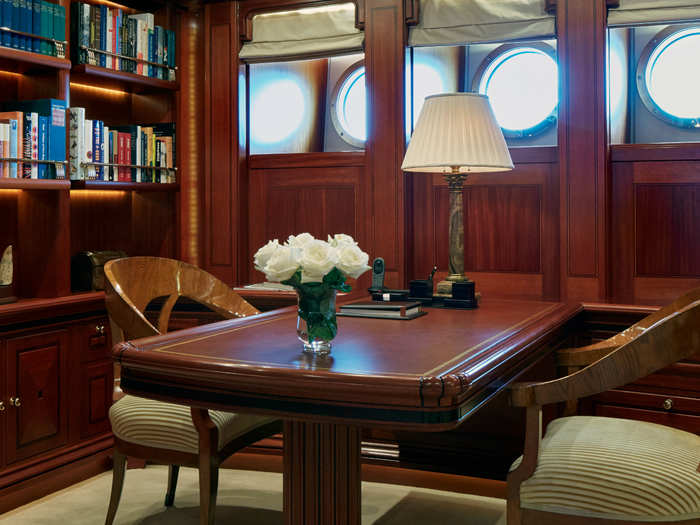 Circular windows in the study room keep the yacht