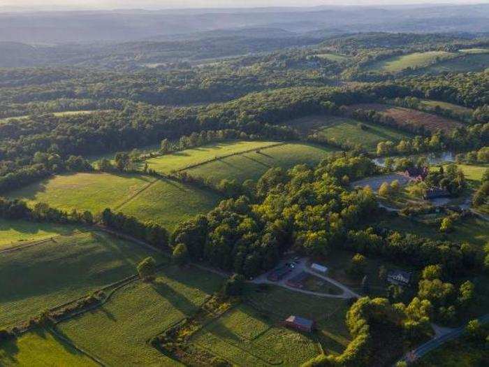 Rolling green hills make for a dramatic setting.