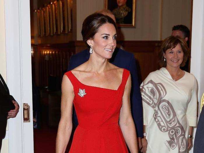 And here is she attending a formal reception in a stunning red gown.