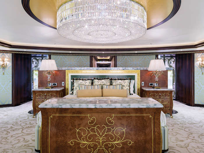 Take the master suite, for example, which comes with a giant, sparkling chandelier overhead and a massive king-sized bed.