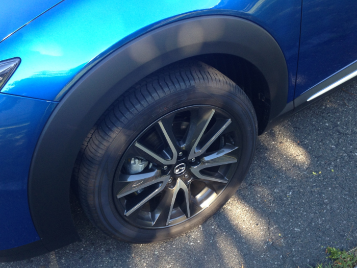 The matte-black wheel arches provide the little ute with some needed heft. It