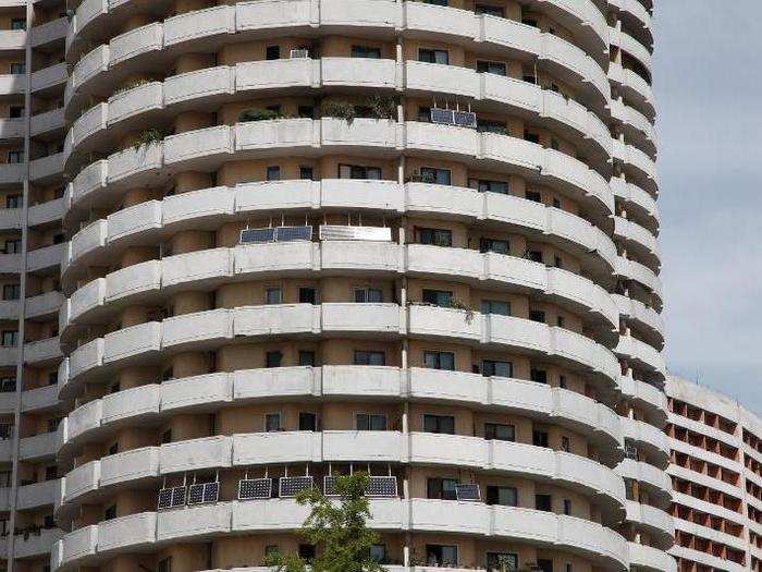 Some apartment buildings sport solar panels.