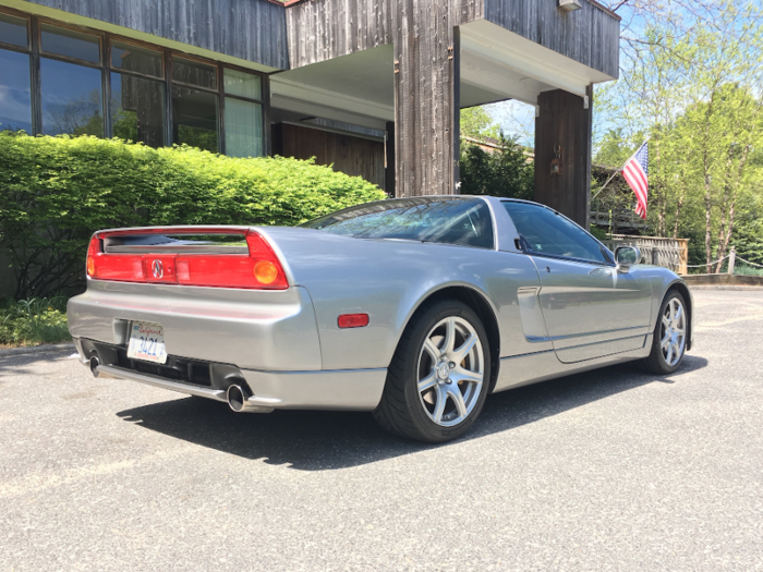 The NSX features the standard mid-engine supercar layout, with its motor tucked neatly between the rear wheels and the driver