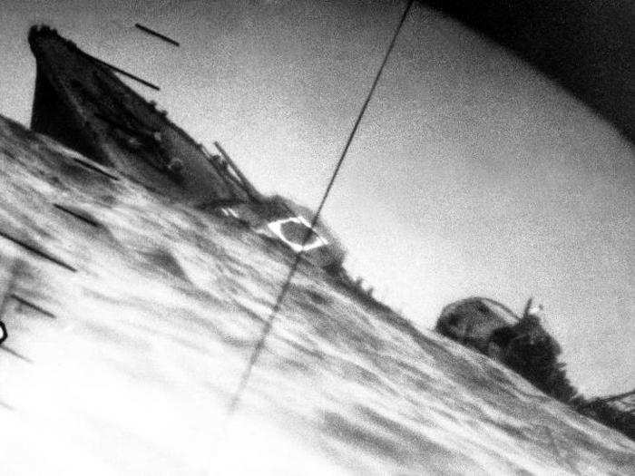 The US Navy led the war against the Japanese in the Pacific. This 1942 photo shows the torpedoed Japanese destroyer Yamakaze photographed through the periscope of USS Nautilus.