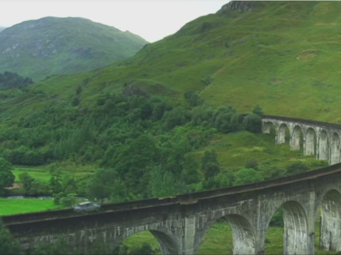 Glenfinnan Viaduct in Scotland is used for the iconic scene in "Harry Potter and the Chamber of Secrets" where Harry and Ron are following the Hogwarts Express in a flying car.