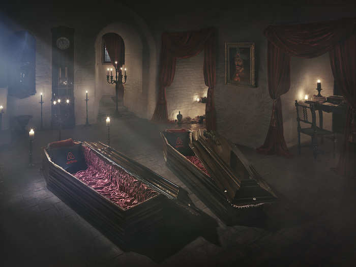 After dinner, the guests will be left to sleep in these cosy, velvet-trimmed coffins in the castle