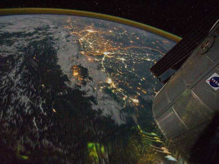 Also taken by the International Space Station, this photograph shows the border between India (which is above the border) and Pakistan (which is south of the border). The border is the bright orange line visible in the photograph, and its illumination comes from the spotlights India placed along it to detect smugglers.