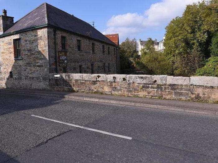 Here, the subtle change in the road pavement indicates the border between the Republic of Ireland, which is to the left, and Northern Ireland, on the right, in the border town of Pettigo, Northern Ireland.