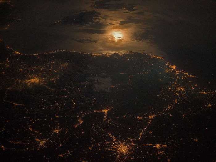 This image, taken by the International Space Station around 11:55 p.m., shows the nighttime appearance of the France-Italy border. The three highly lit areas are Torino in Italy, and Lyon and Marseille in France. The border can be seen in the center of the photograph.