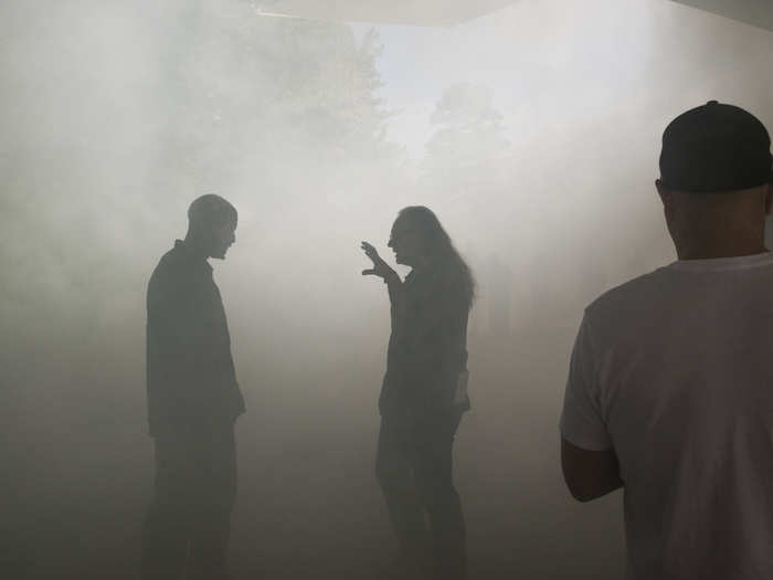 The fog created for the set was so thick you can barely make out Nicotero giving cues to a walker here.