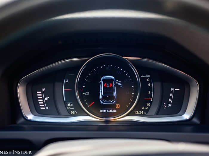 In front the driver is a beautifully rendered digital instrument cluster.