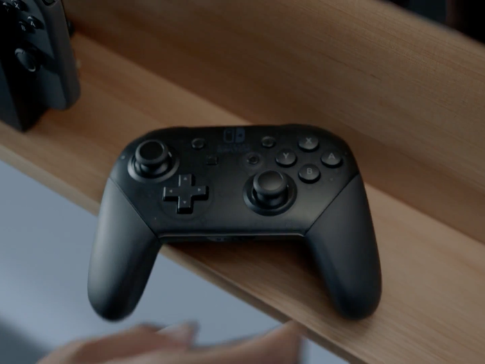 If the dog controller looks uncomfortable to you, the Nintendo Switch Pro Controller is a much more conventional console controller for TV play. It has all the same buttons and the same functionality, but looks much more comfortable. We