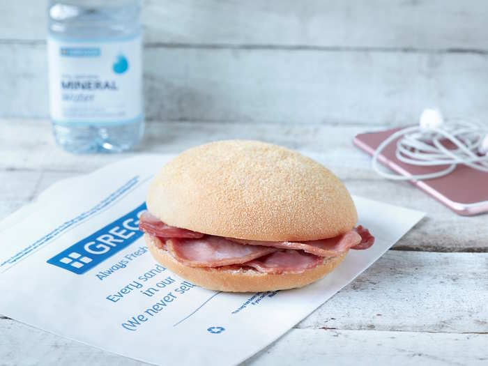 Greggs Bacon Roll is a simple British classic, with a round, soft white bun packed with rashers of bacon...