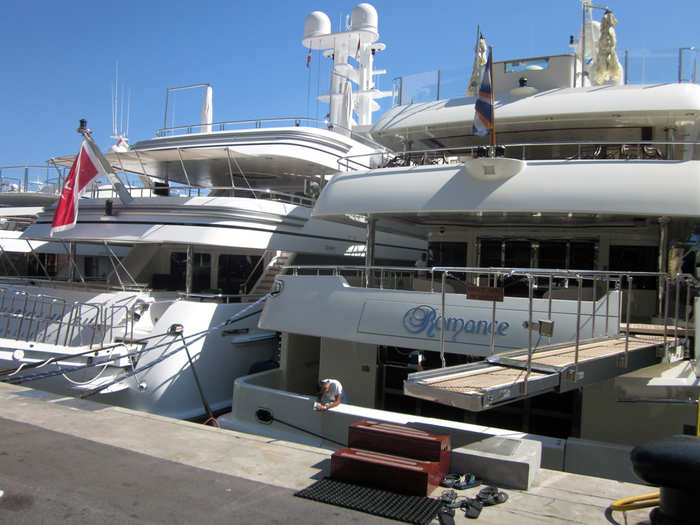 Cruising yachts were stuffed in like sardines. We saw crew members scrubbing the decks and doing other maintenance jobs.