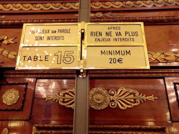 Signs in the Salle Medecin let gamblers know the minimum bets. While the casino is a huge moneymaker for Monaco, its citizens are barred from gambling there.