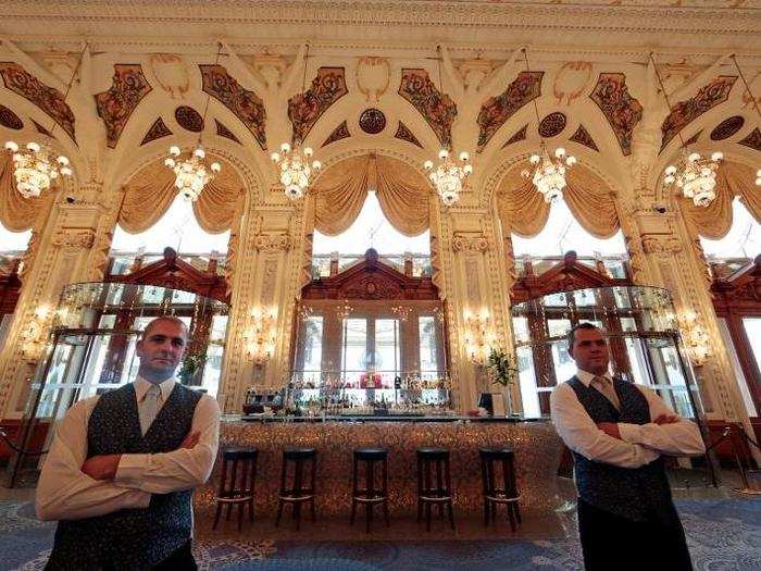 The casino and Monte Carlo were featured in the James Bond movies "Never Say Never Again" and "GoldenEye." Here, barmen Damien Dellerba (L) and Sylvain Pastoret pose in front of their bar in the private rooms of the Salle Blanche.