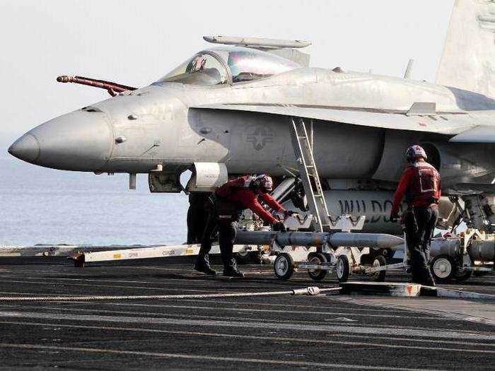 "Red Shirts" also move in and disarm the jets, storing unused ordnance deep below decks until the next mission.