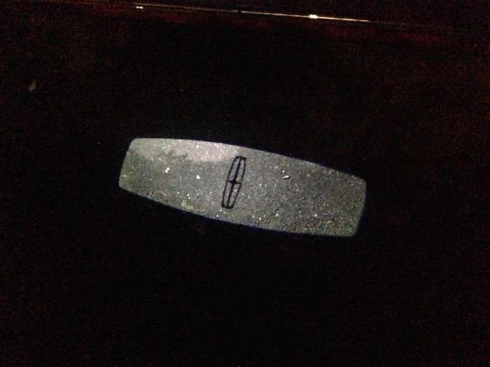 At night, a lighted welcome mat with the Lincoln badge is presented before you get into the Continental.