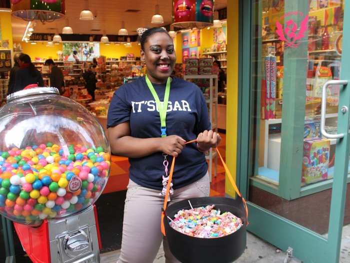 Yami works at a candy store. It was a very popular stop for kids and adults alike. By 2:30 p.m., she had re-filled that bucket "like four times already!” Kids had the choice of three pieces each.