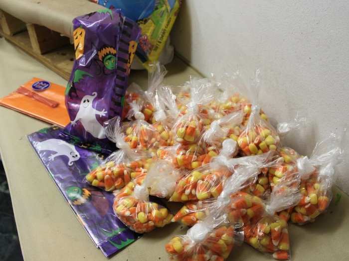 She hand-tied bags of candy corn, and put them in decorative pouches along with some other goodies. At least 21 kids from the building were expected between 3 p.m. and 4 p.m.