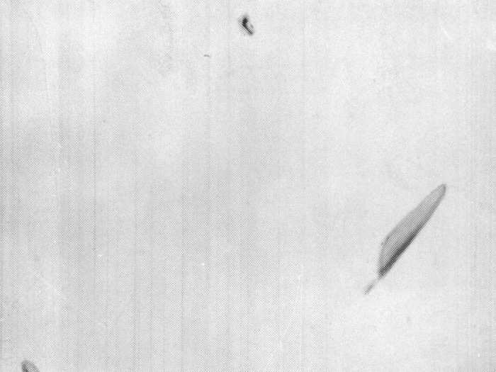 A British RAF fighter pilot bails out after the wing of his Hawker Hurricane aircraft is torn off by a German fighter plane, in a dogfight over England, in November 1940.