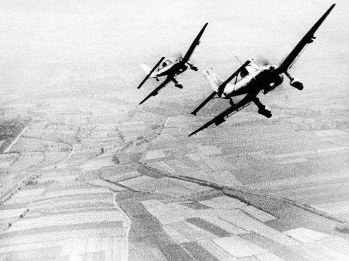 Two German Luftwaffe Ju 87 Stuka dive bombers are seen returning from an attack against the British south coast, during the Battle for Britain, on August 19, 1940.