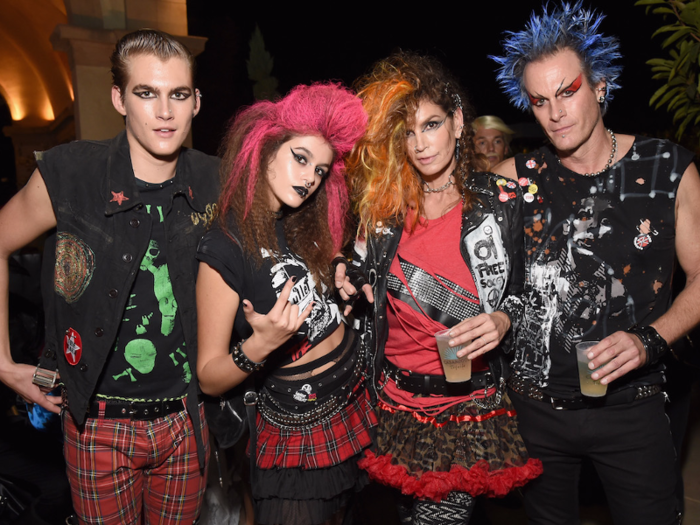 Model Cindy Crawford and her family dressed as punks.