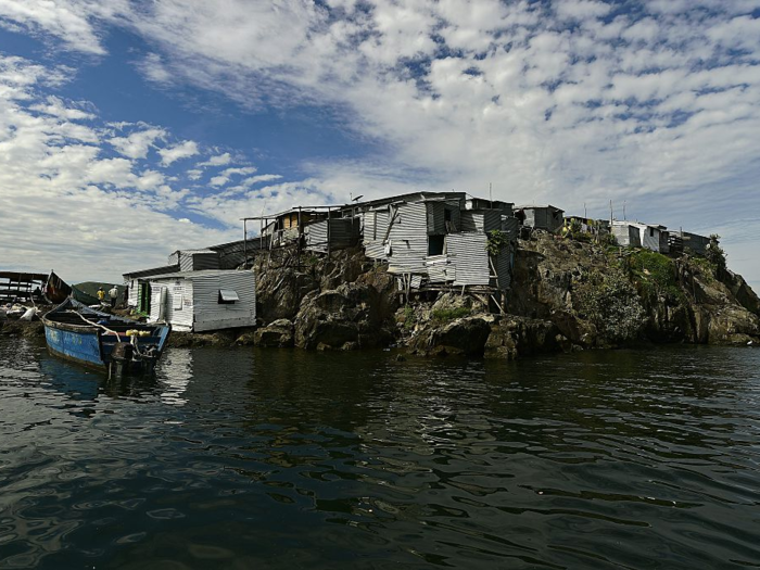 Kenyans and Ugandans now share space on the small rock that is less than half the size of a football field.