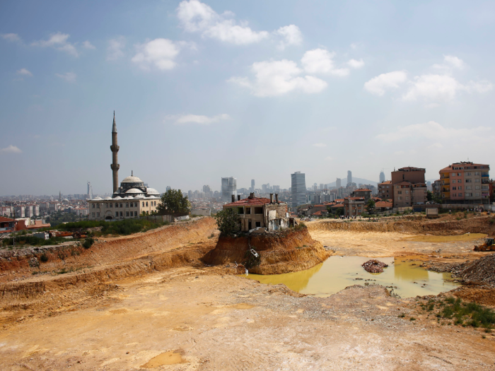 The phenomenon also happens in other places around the world. In Turkey, the "Lone House" belonged to a family who fought to keep it from getting demolished. However, they ultimately had to leave.