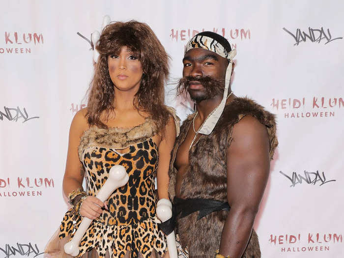 New York Giants running back Bobby Rainey and his wife dressed as cavemen.