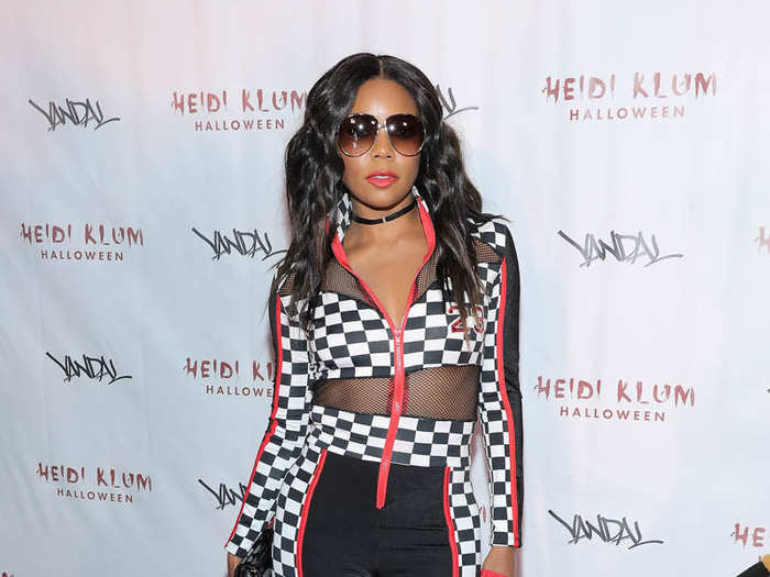 Before Klum arrived with her entourage, guests began gracing the red carpet at Vandal. Actress Gabrielle Union arrived in this race car driver costume.