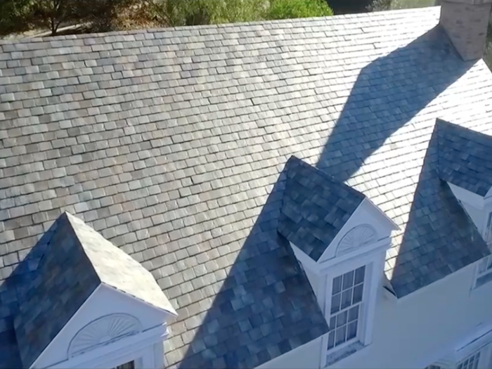 "My roof is a French slate roof, that’s one of the tile styles I wanted to do," Musk said on Tuesday