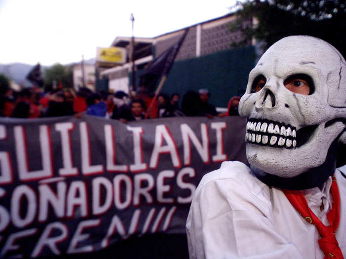 In 2002, a crowd carried a banner that read "Guilliani dreamers never die" (in homage to the anti-globalization protester shot dead by a police officer the year before).