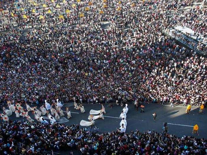 Tens of thousands of people turned out for the Day of the Dead parade in Mexico City this year.