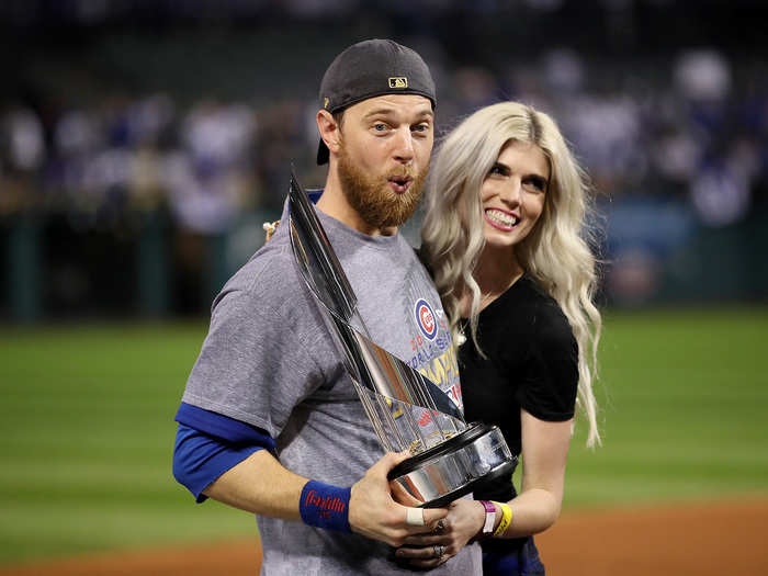 Ben Zobrist celebrated with his wife, Julianna, and the MVP trophy.