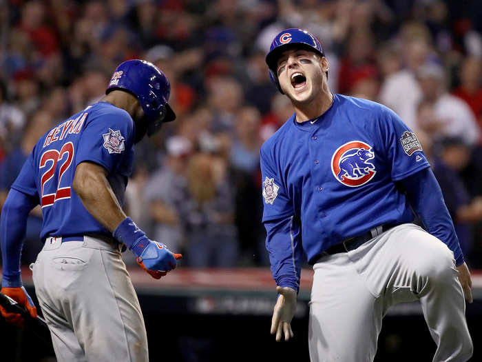 Anthony Rizzo reacts to scoring a run in the tenth inning.