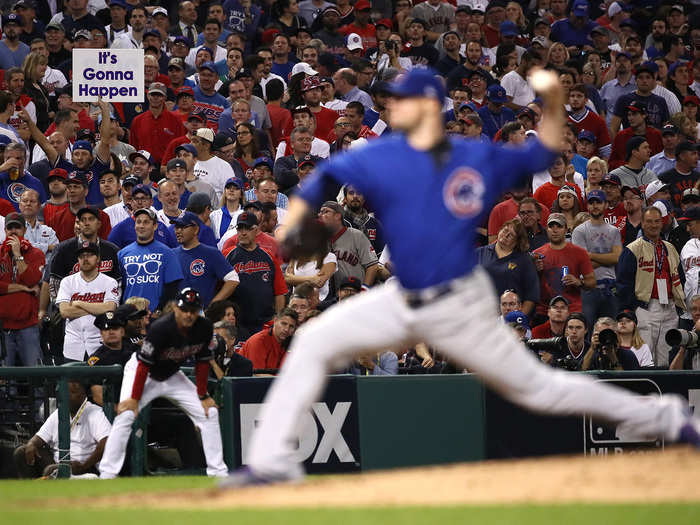 An optimistic Cubs fan holds up a sign during the eighth inning.