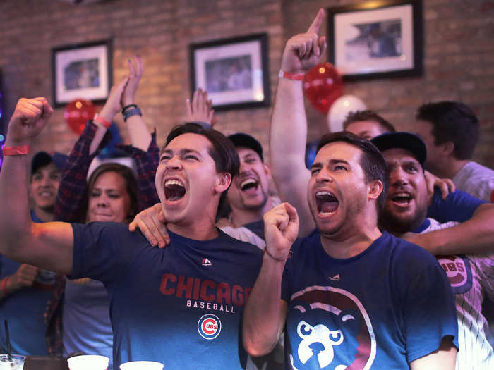 Cubs fans celebrate in a Wrigleyville bar.