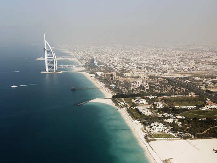 The Burj Al Arab, the fourth-tallest hotel in the world, dominates the Dubai skyline.