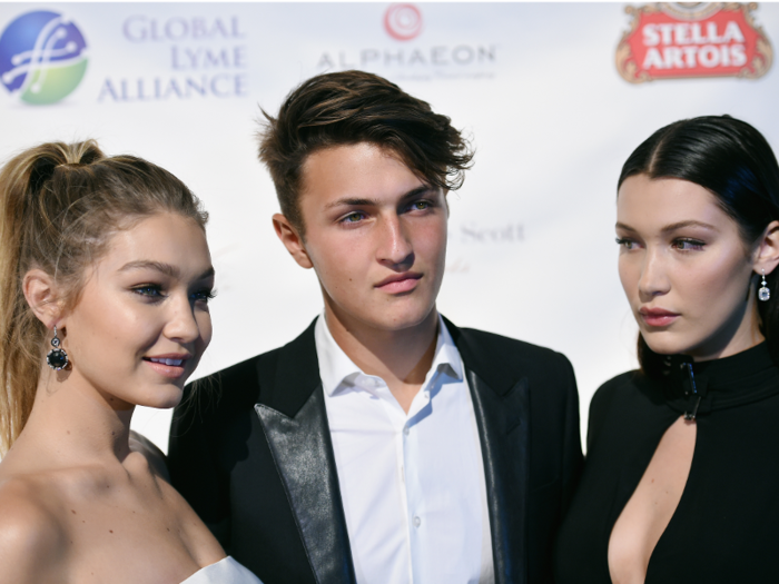 Bella and Gigi Hadid have a 17-year-old younger brother named Anwar who is following them into the modeling world.