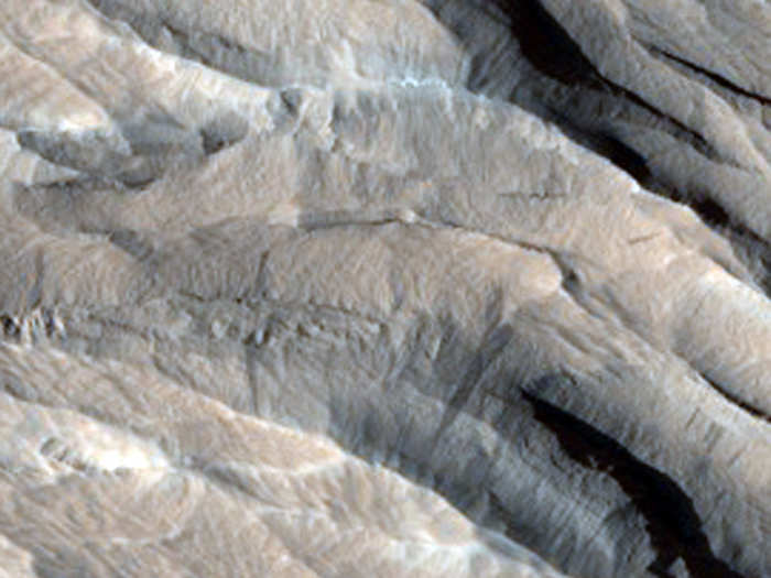 Yardangs, which are sharp ridges scraped away by Mars