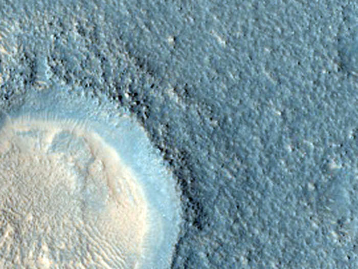 A crater on Arcadia Planitia, a large flat region of Mars.